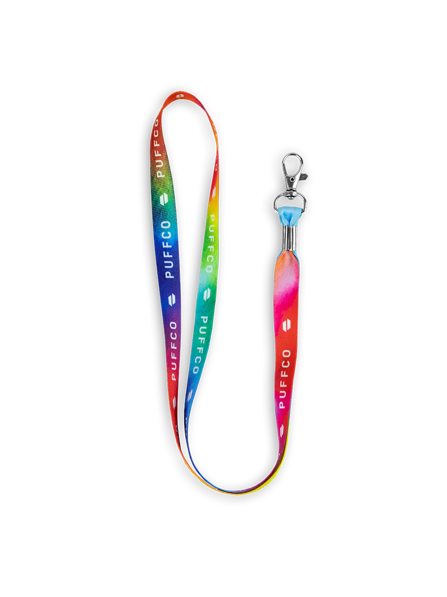 Puffco Tie Dye lanyard with rainbow gradient, white Puffco logos, and a silver metal clasp.