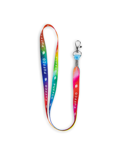 Puffco Tie Dye lanyard with rainbow gradient, white Puffco logos, and a silver metal clasp.