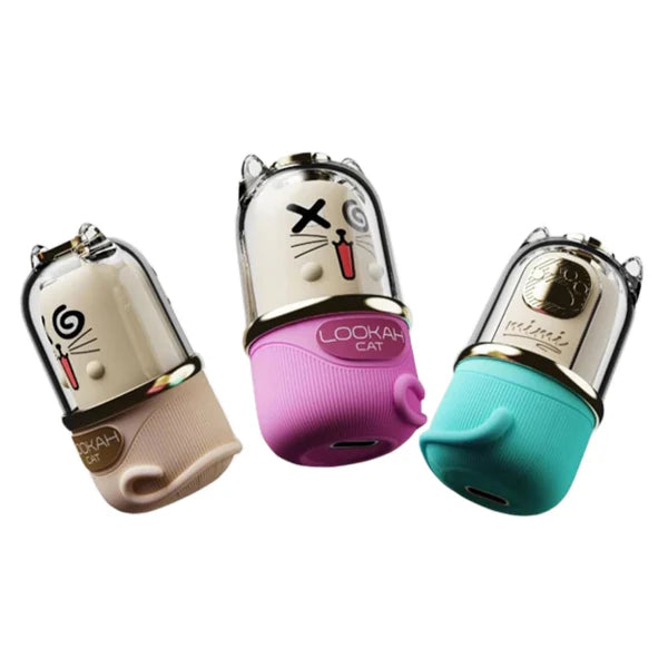 Three Lookah Cat 510 vape batteries in beige, pink, and teal, featuring a cat design with clear tops.