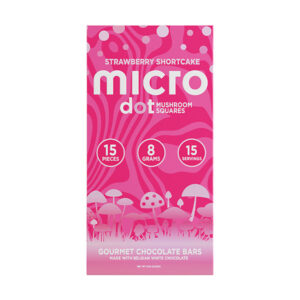 Pink Micro Dot Strawberry Shortcake mushroom chocolate bar with wavy patterns and mushroom graphics.